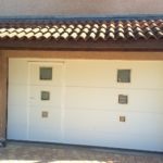 Porte de garage sectionnelle avec portillon intégré